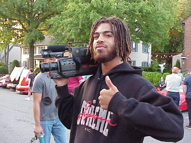 With a VHS Camcorder. Taken with a Sony FD91.