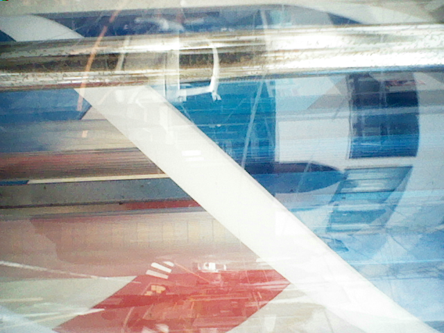 Close-up of a barber sign. Taken with a Nintendo DSi.